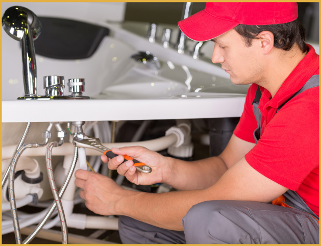 a plumber repairing shower walls and pipes